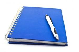 Notebook and pen isolated